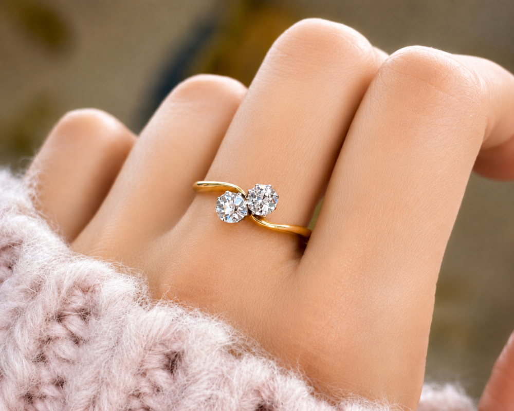 Antique 1930s diamond toi et moi diamond ring with approx 0.4ct in 18ct yellow gold for sale in Leeds, shown on a model's hand
