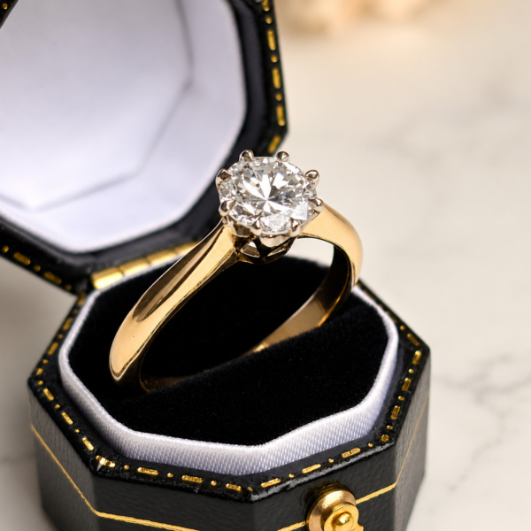 antique Art Deco 1ct diamond solitaire ring in 18ct yellow gold and platinum for sale in Leeds, shown in a black ring box