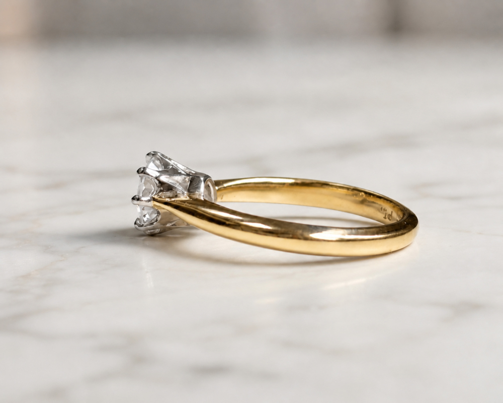 antique Art Deco 1ct diamond solitaire ring in 18ct yellow gold and platinum for sale in Leeds, side view of the ring