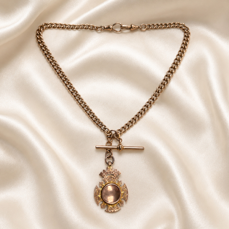 antique Edwardian 9ct gold albert chain with medal, t bar and dog clips
