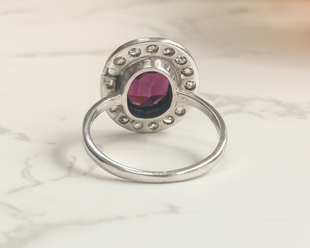 Art Deco garnet and diamond cluster ring in 18ct white gold and platinum for sale in Leeds, UK, showing rear of the ring