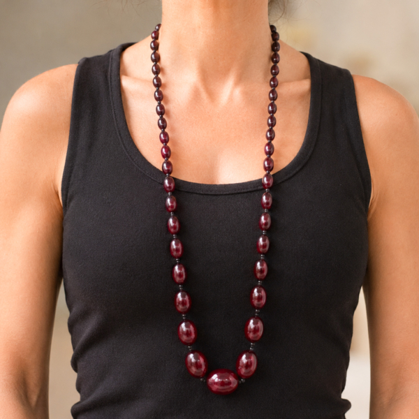antique bakelite beads on a model