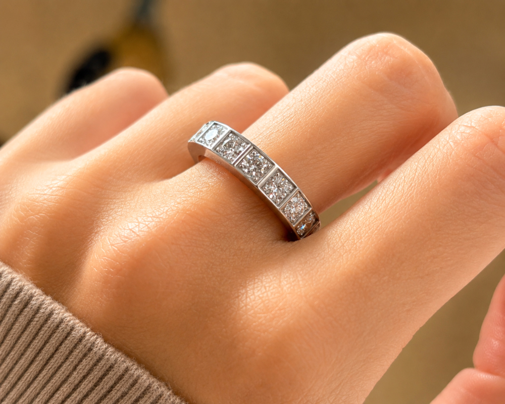 Vintage Cartier diamond half eternity ring in 18ct white gold. 1.9ct for sale in Leeds, shown on hand
