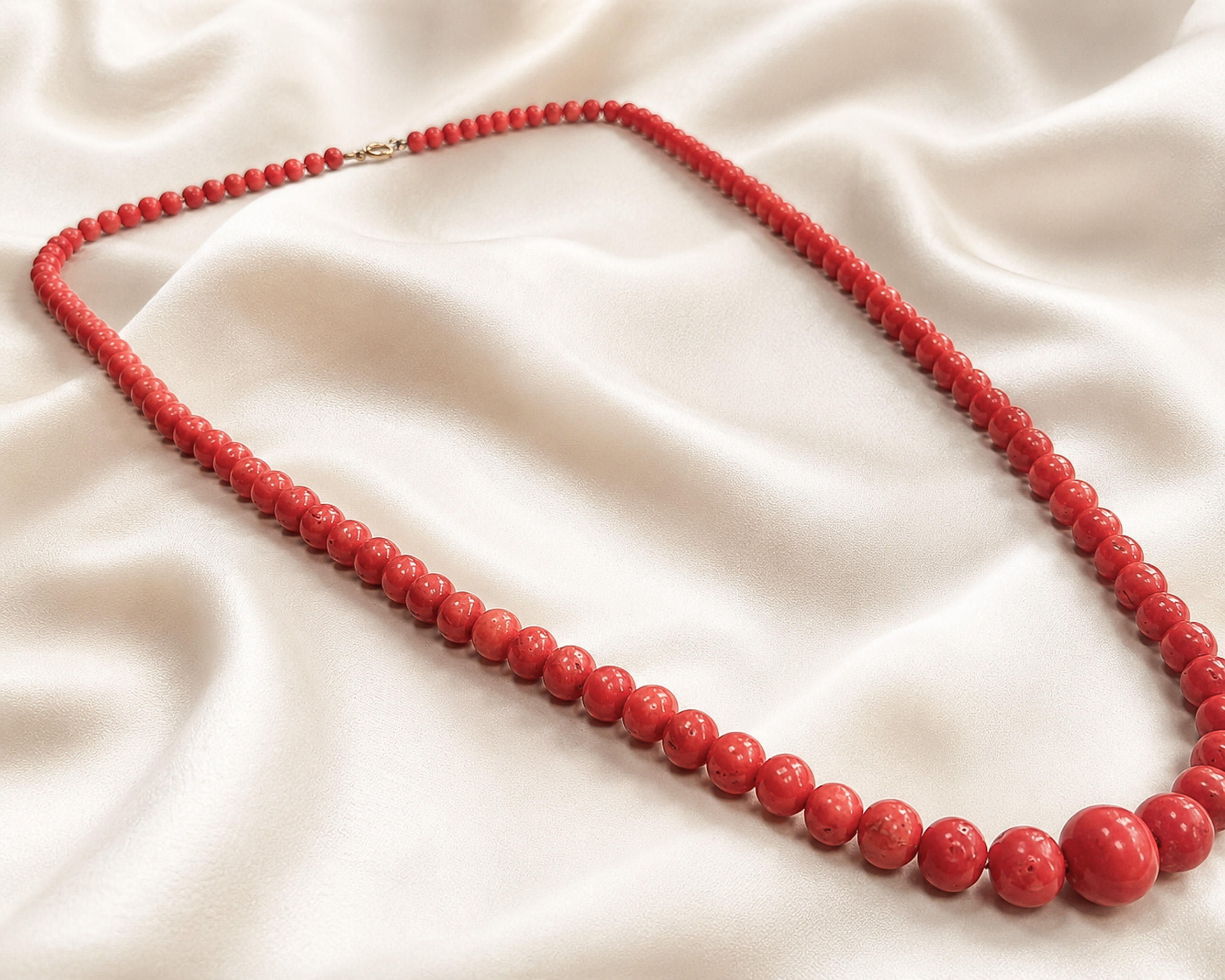 coral beads flatlay