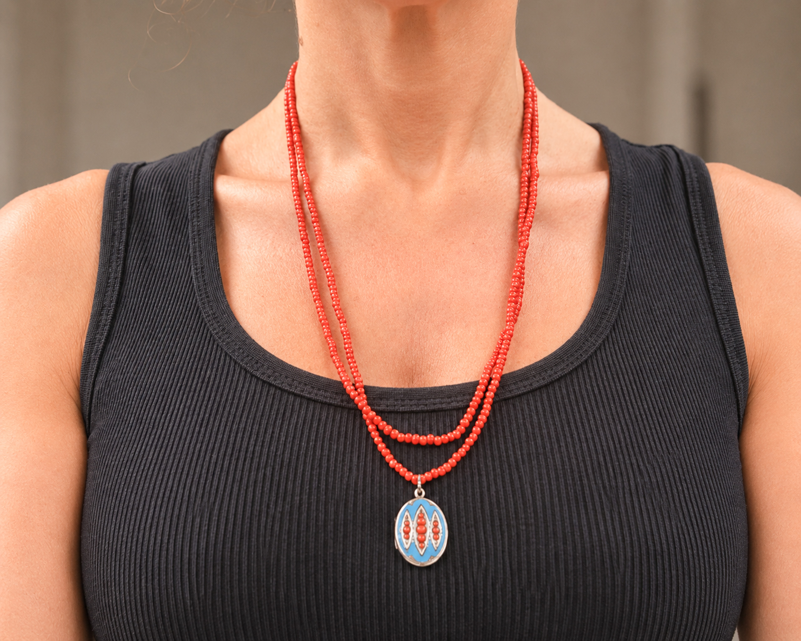 coral beads on model