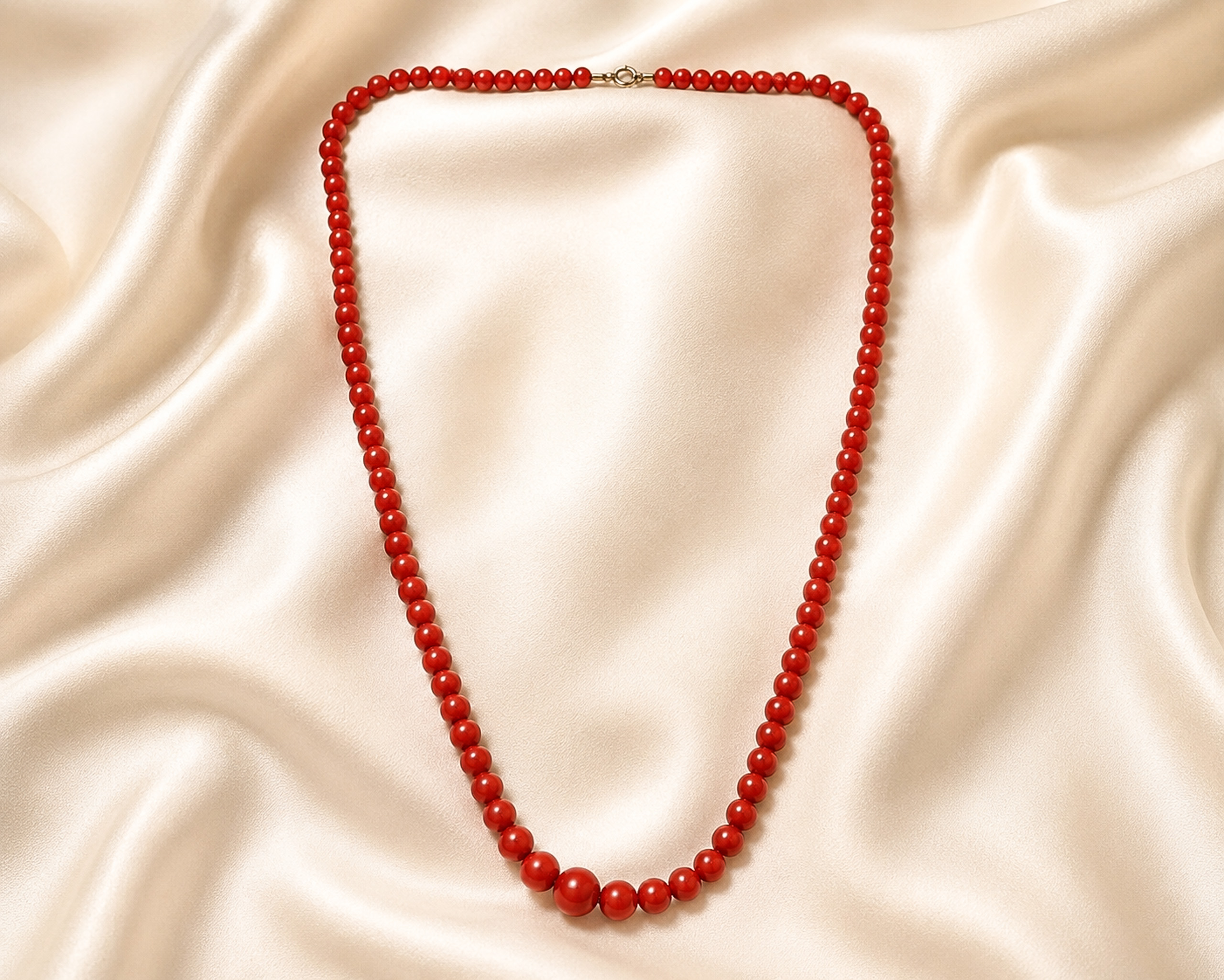 coral beads on silk
