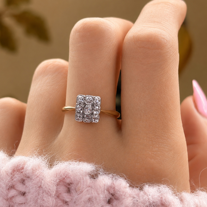 Art deco diamond panel ring in 18ct gold and platinum for sale in Leeds, shown on model