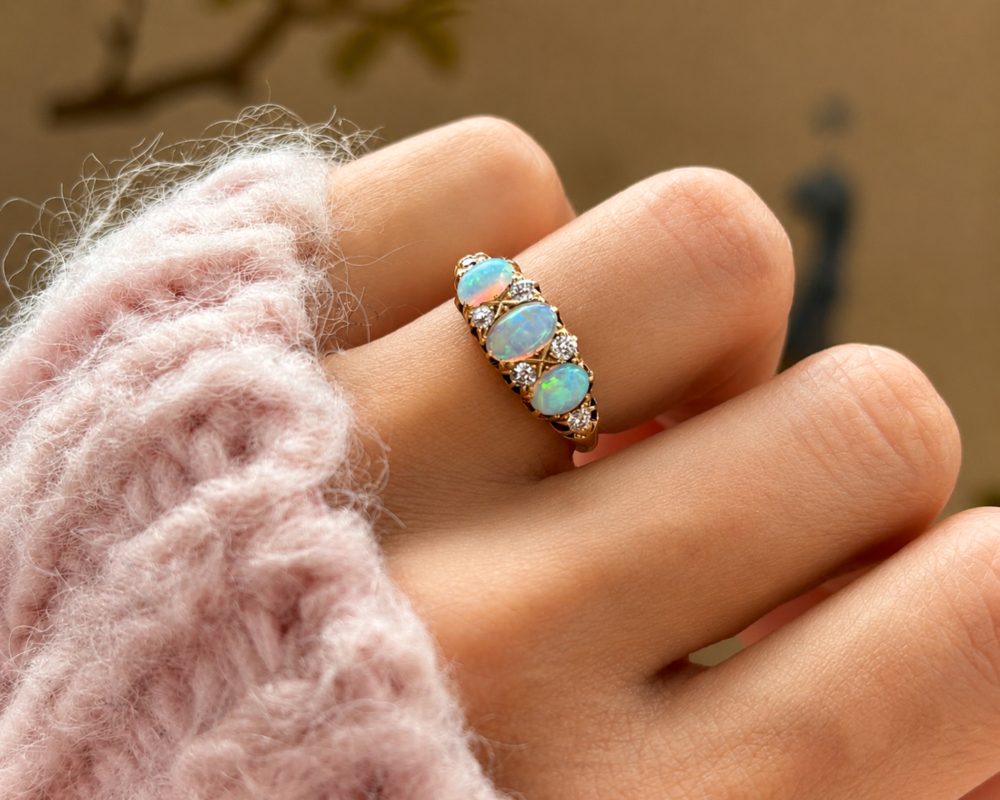 antique Victorian opal and diamond ring im 18ct yellow gold for sale in Leeds shown on model's hand