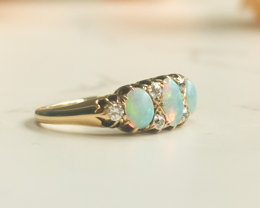 antique Victorian opal and diamond ring im 18ct yellow gold for sale in Leeds, showing the side profile of the ring