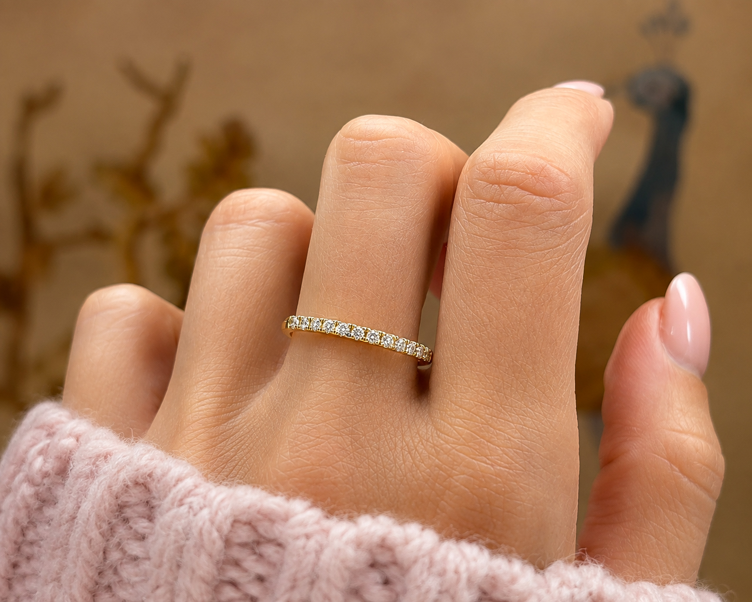 18ct gold half eternity ring on hand