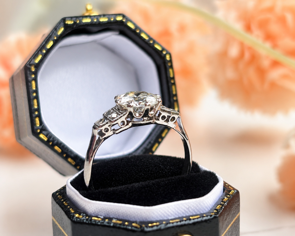 Art Deco 1.5ct diamond solitaire ring VVS1 clarity in platinum. Old cut centre stone and french cut side diamonds. For sale in Leeds, showing underside of the ring
