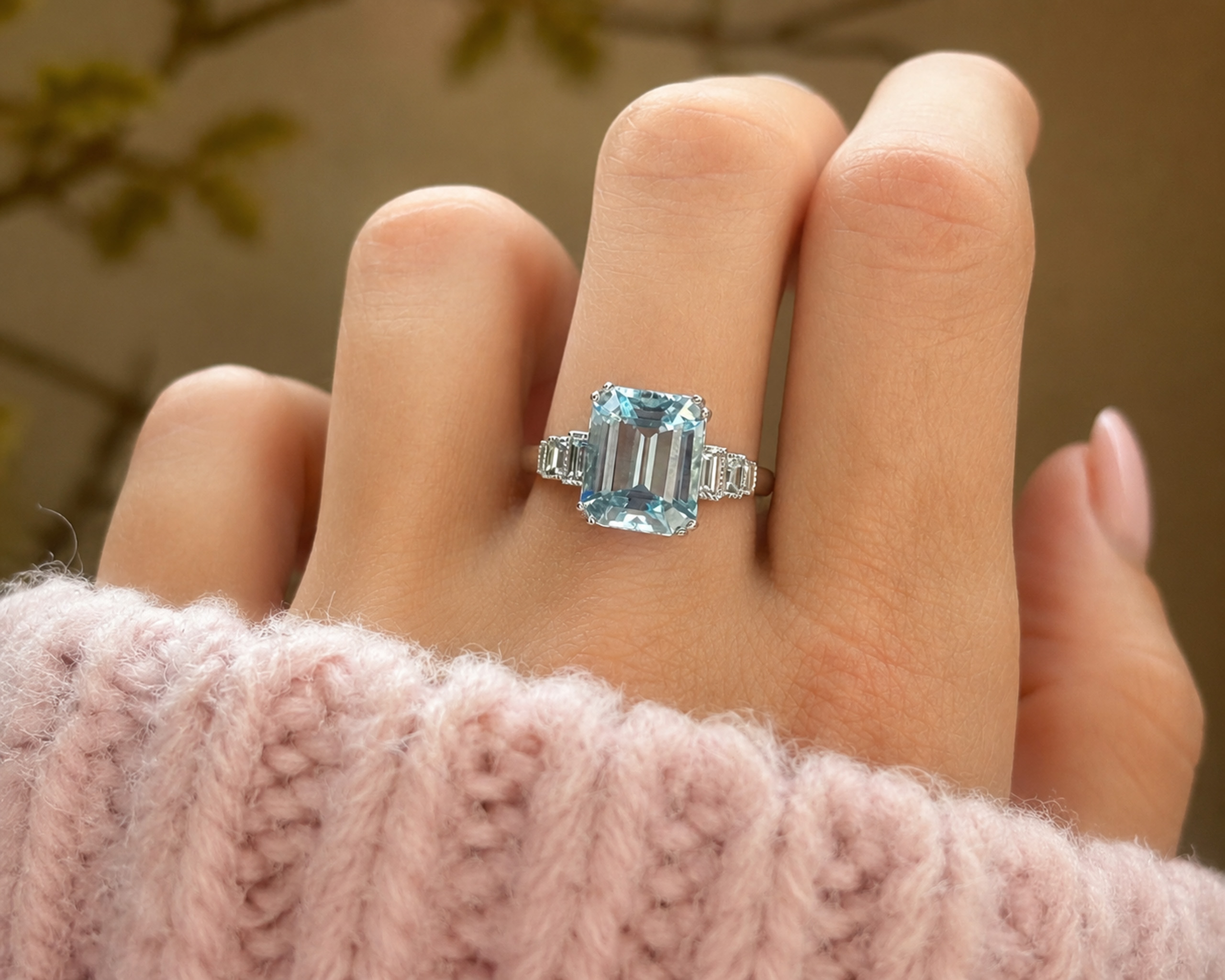 art deco style aquamarine ring on hand