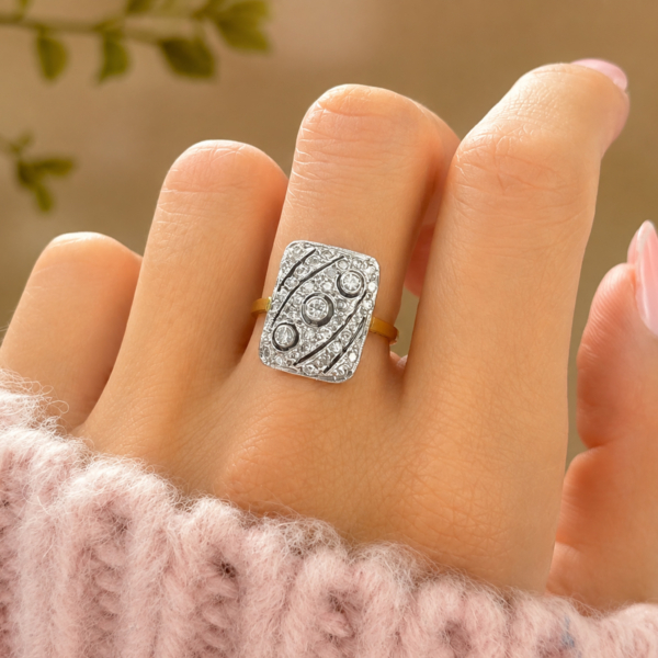 Art Deco style diamond panel ring in 18ct yellow gold for sale in Leeds, shown on models hand