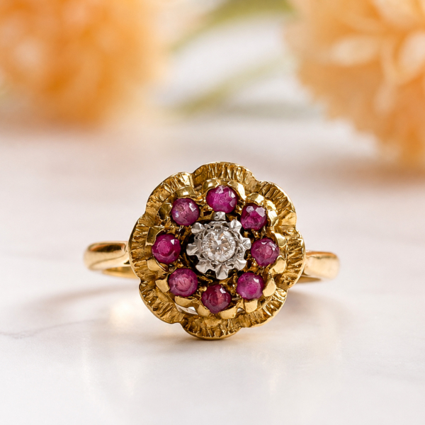 vintage ruby and diamond cluster ring in 18ct yellow gold circa 1950s for sale in Leeds