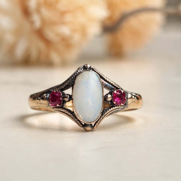 antique Victorian opal ring set with rubies in 15ct gold for sale in Leeds