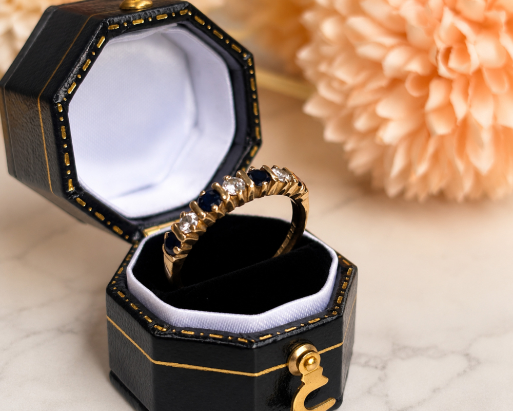 vintage sapphire stacking ring set with diamonds in 9ct gold for sale in Leeds, shown in a black ring box