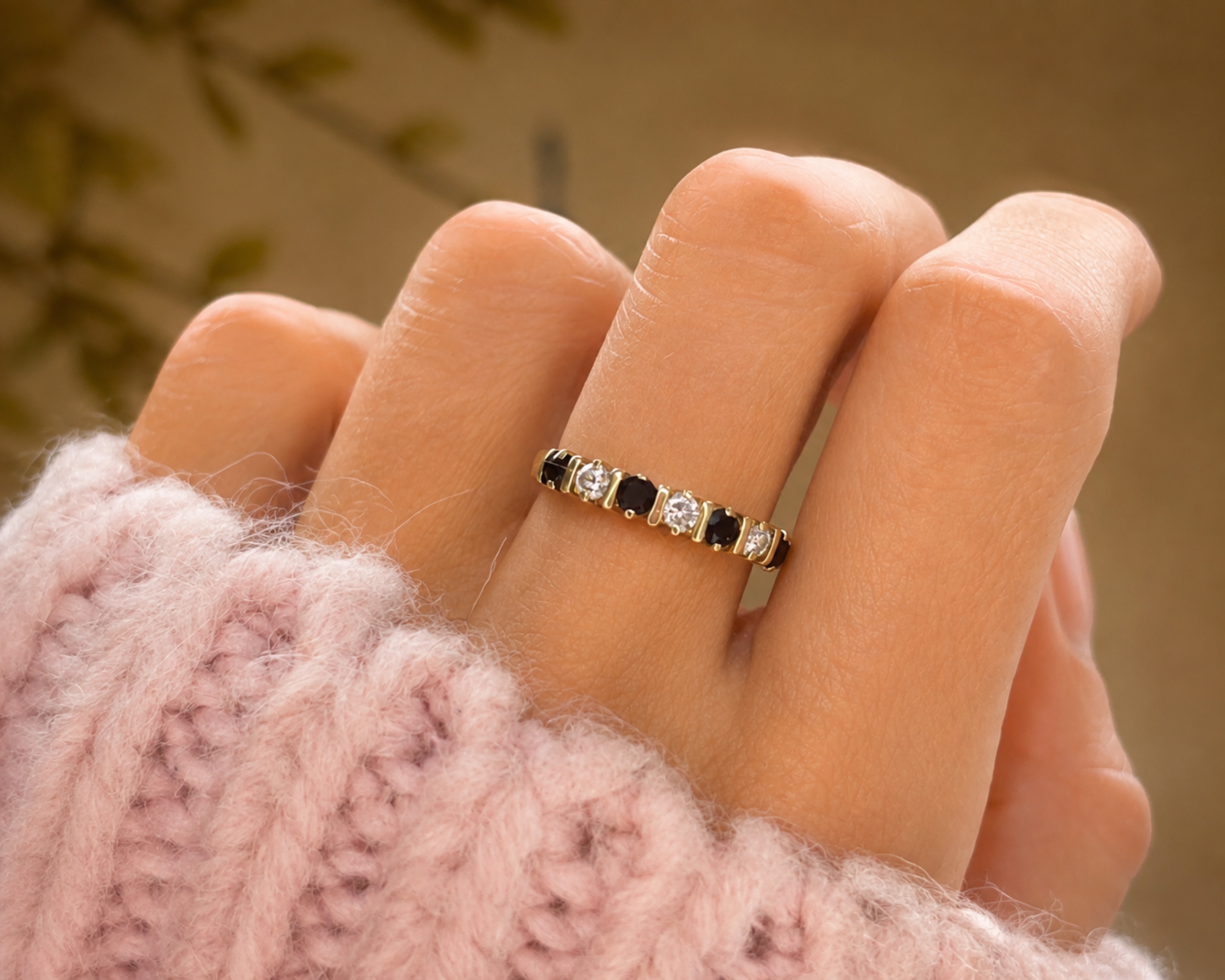 sapphire stacking ring on hand