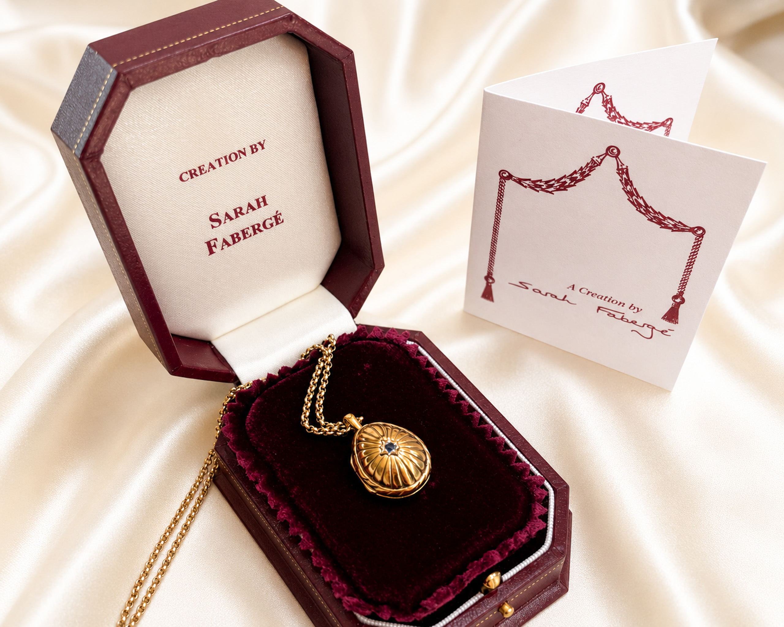 Sarah Faberge silver gilt egg pendant in original box with certificate for sale in Leeds