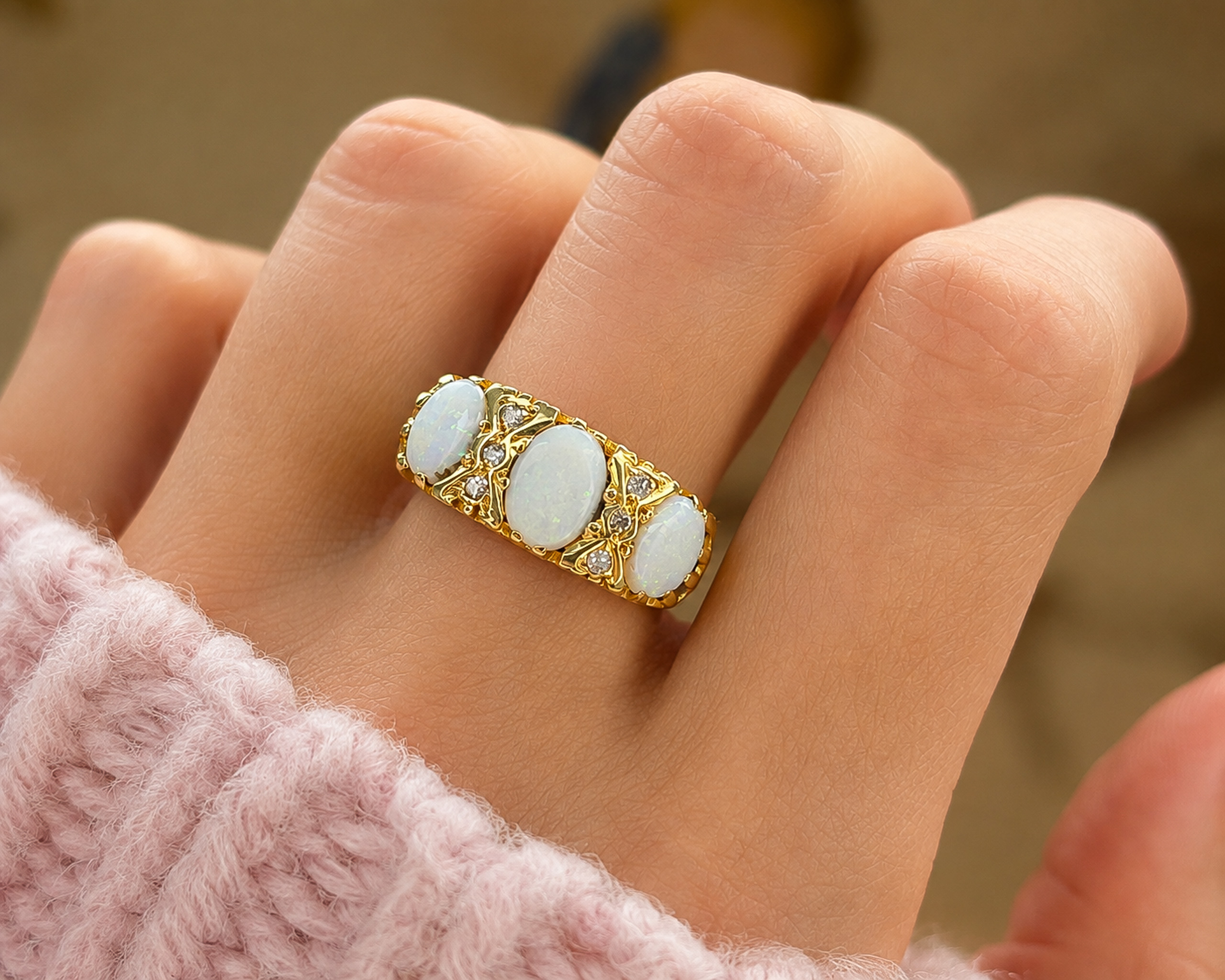 vintage 3 stone opal on hand