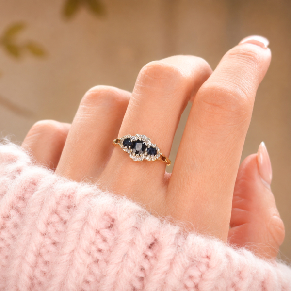 vintage 9ct gold sapphire and diamond ring for sale in Leeds, shown on model's hand