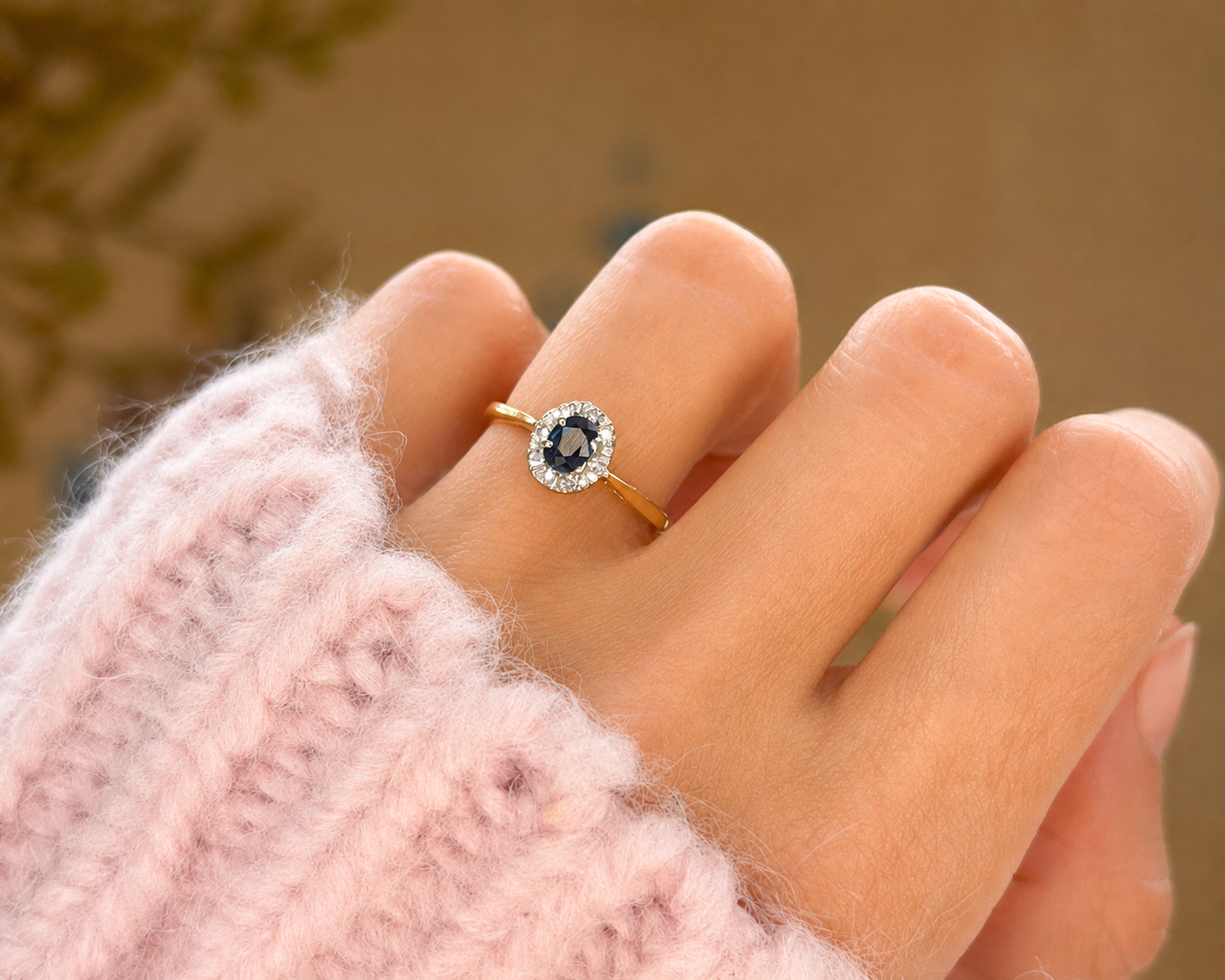 vintage sapphire and diamond ring on hand