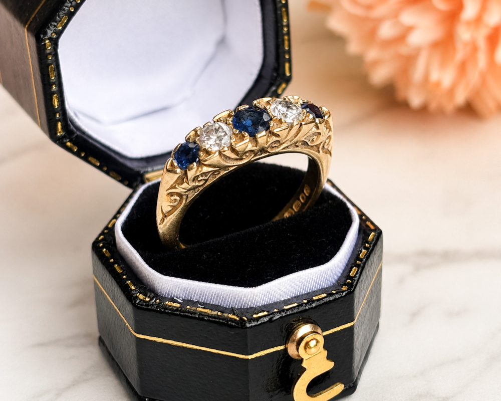 vintage 1960s sapphire and diamond five stone ring in 18ct yellow gold for sale in Leeds, in a black ring box