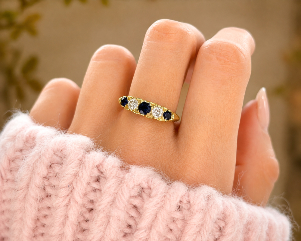 vintage 1960s sapphire and diamond five stone ring in 18ct yellow gold for sale in Leeds, shown on model