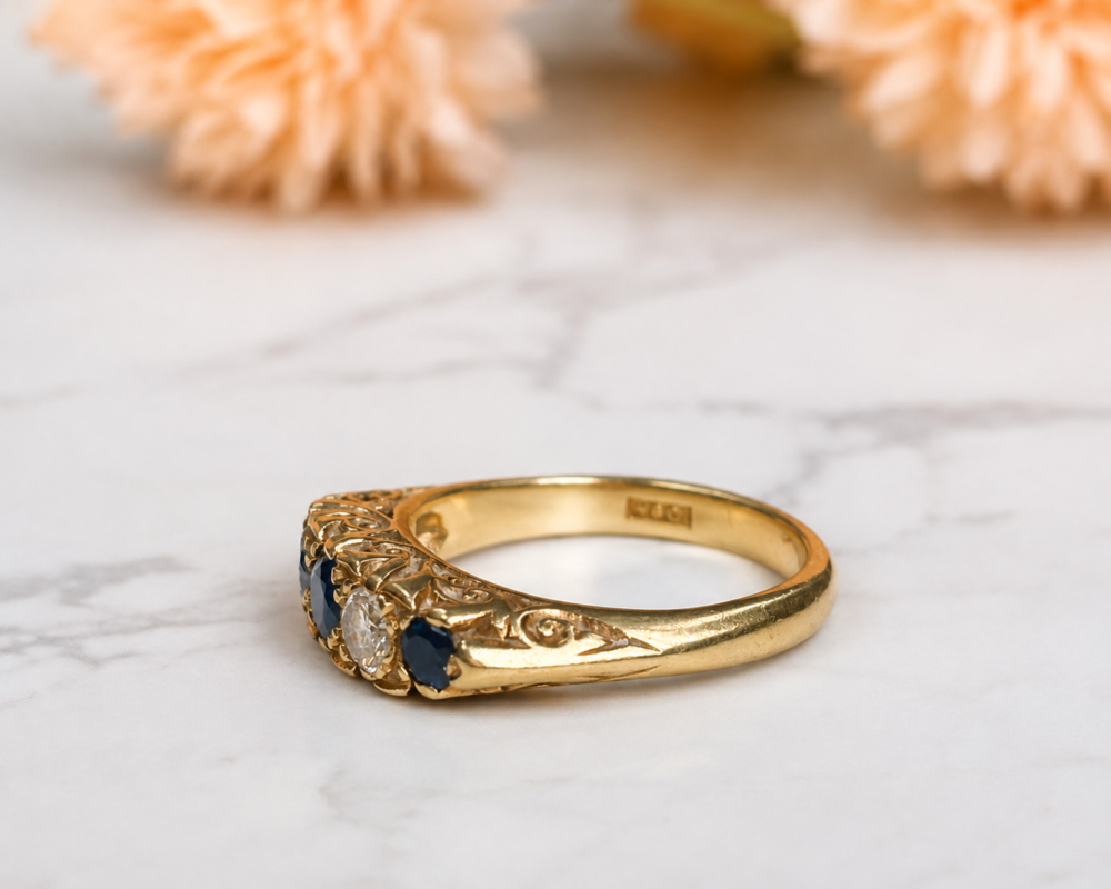 vintage 1960s sapphire and diamond five stone ring in 18ct yellow gold for sale in Leeds, showing side profile of the ring