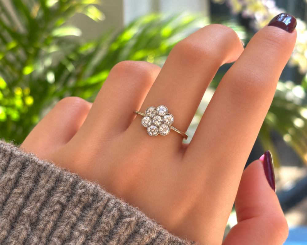 antique Art Deco daisy cluster ring 1ct in 18ct gold for sale in Leeds on a hand
