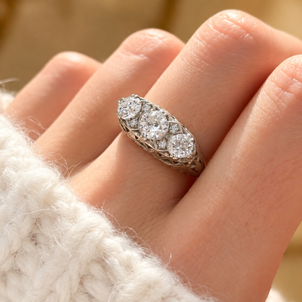 antique Edwardian three stone diamond ring in 18ct white gold with 1.16ct for sale in Leeds, shown on a model's hand