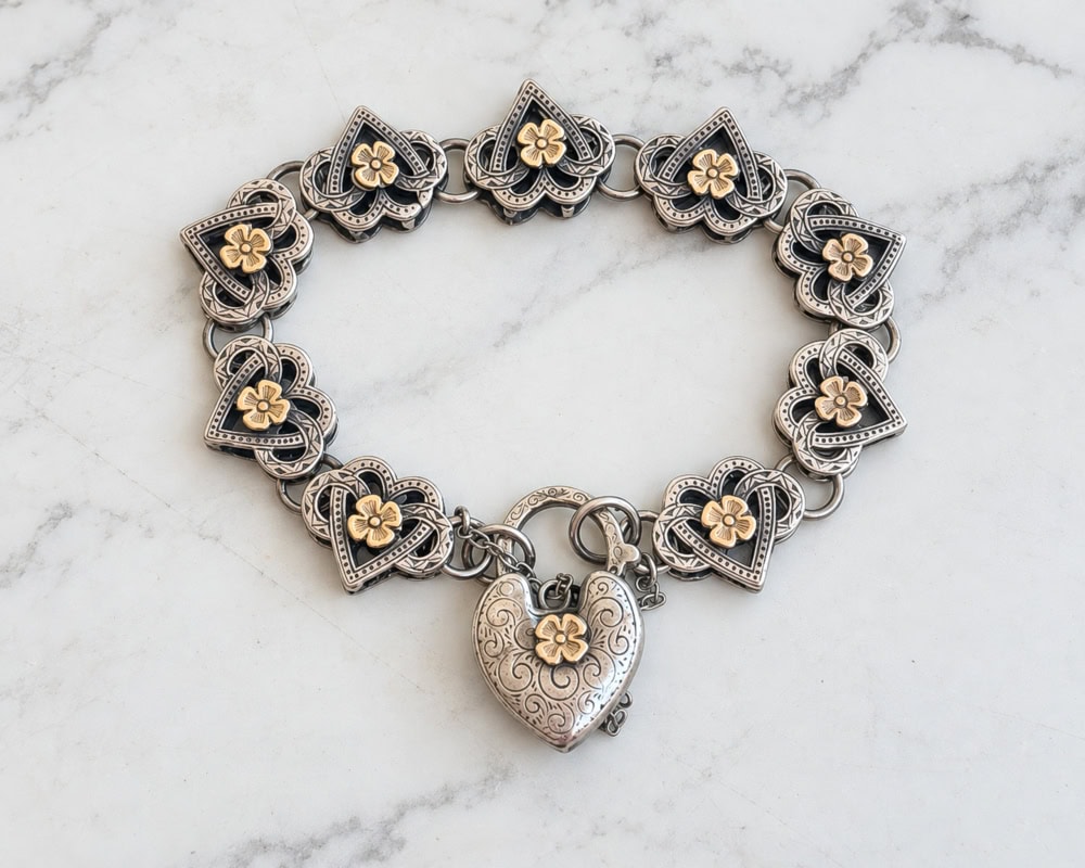 antique Victorian 9ct gold and silver heart padlock bracelet for sale in Leeds