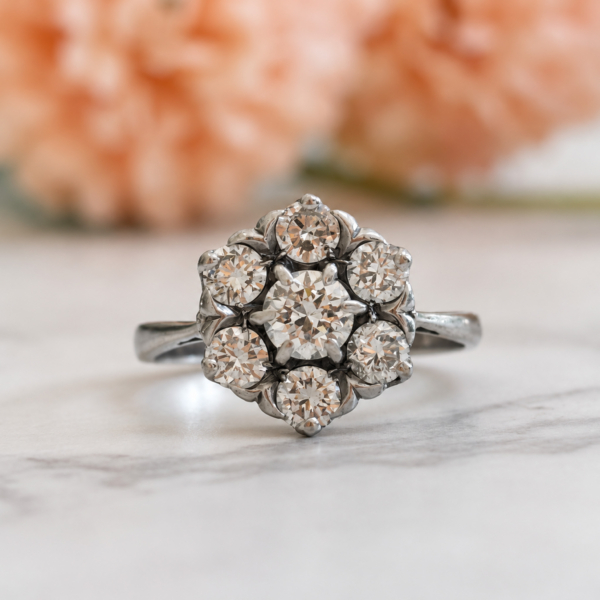 vintage flower diamond cluster ring in 18ct white gold with 1.25ct for sale in Leeds