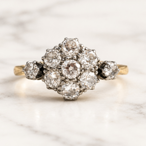 Art Deco diamond daisy cluster ring in 18ct yellow gold and platinum for sale in Leeds
