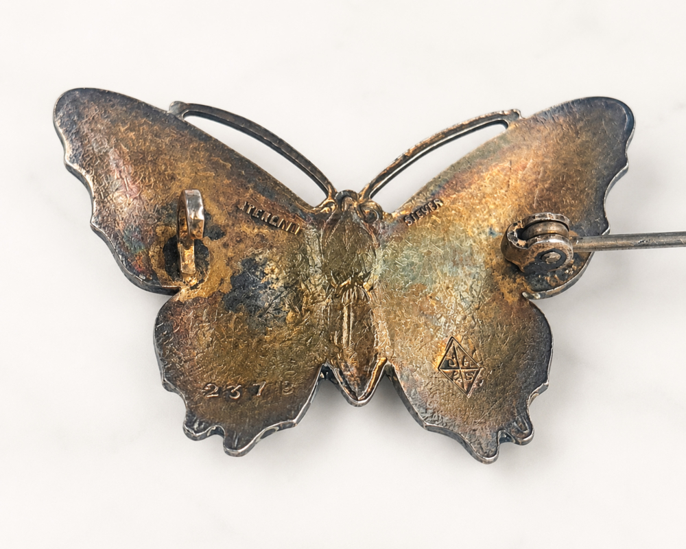 antique silver and enamel butterfly brooch for sale in Leeds, showing the reverse