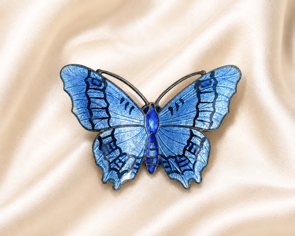 blue butterfly brooch on silk antique silver and enamel butterfly brooch for sale in Leeds