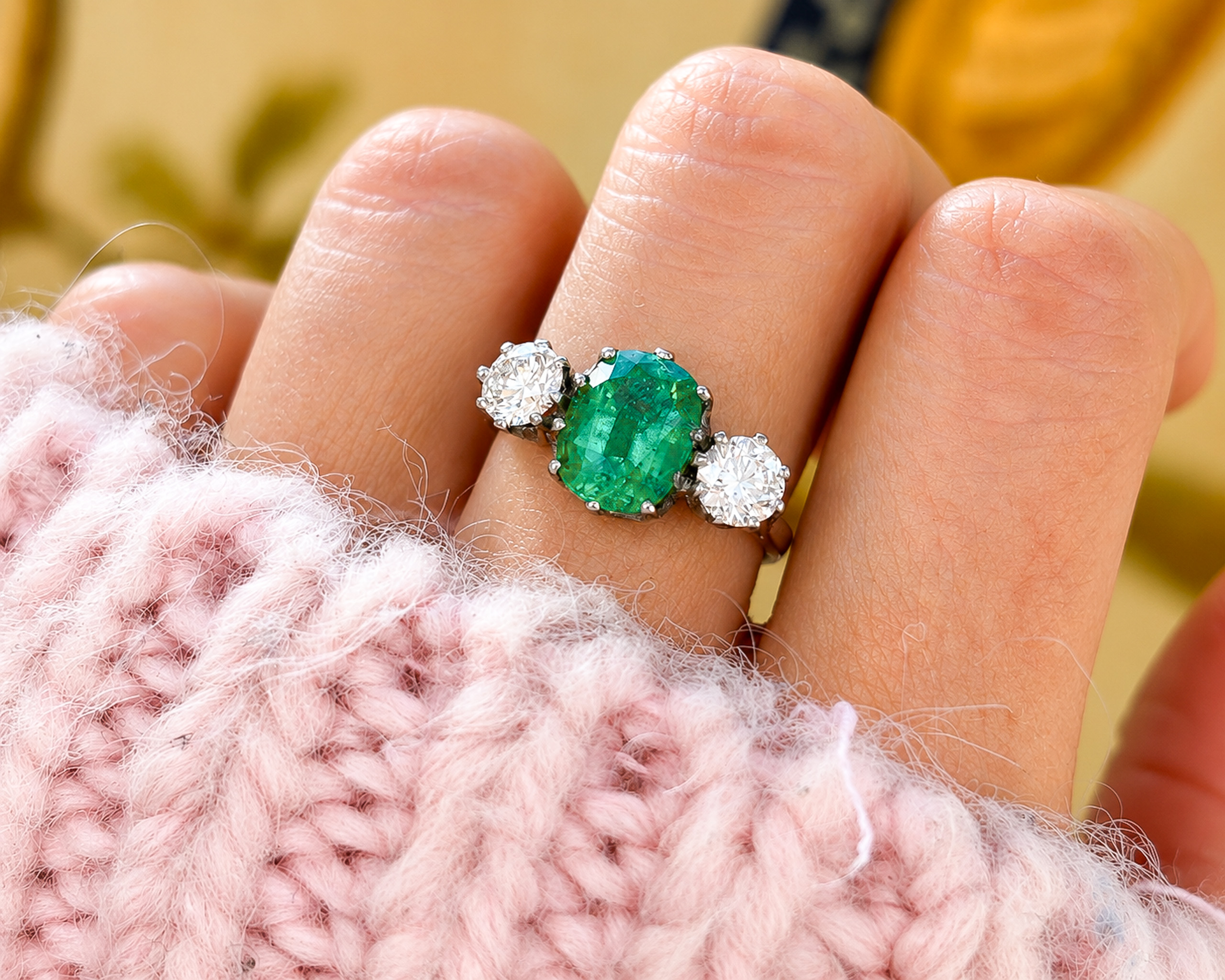 emerald ring on hand