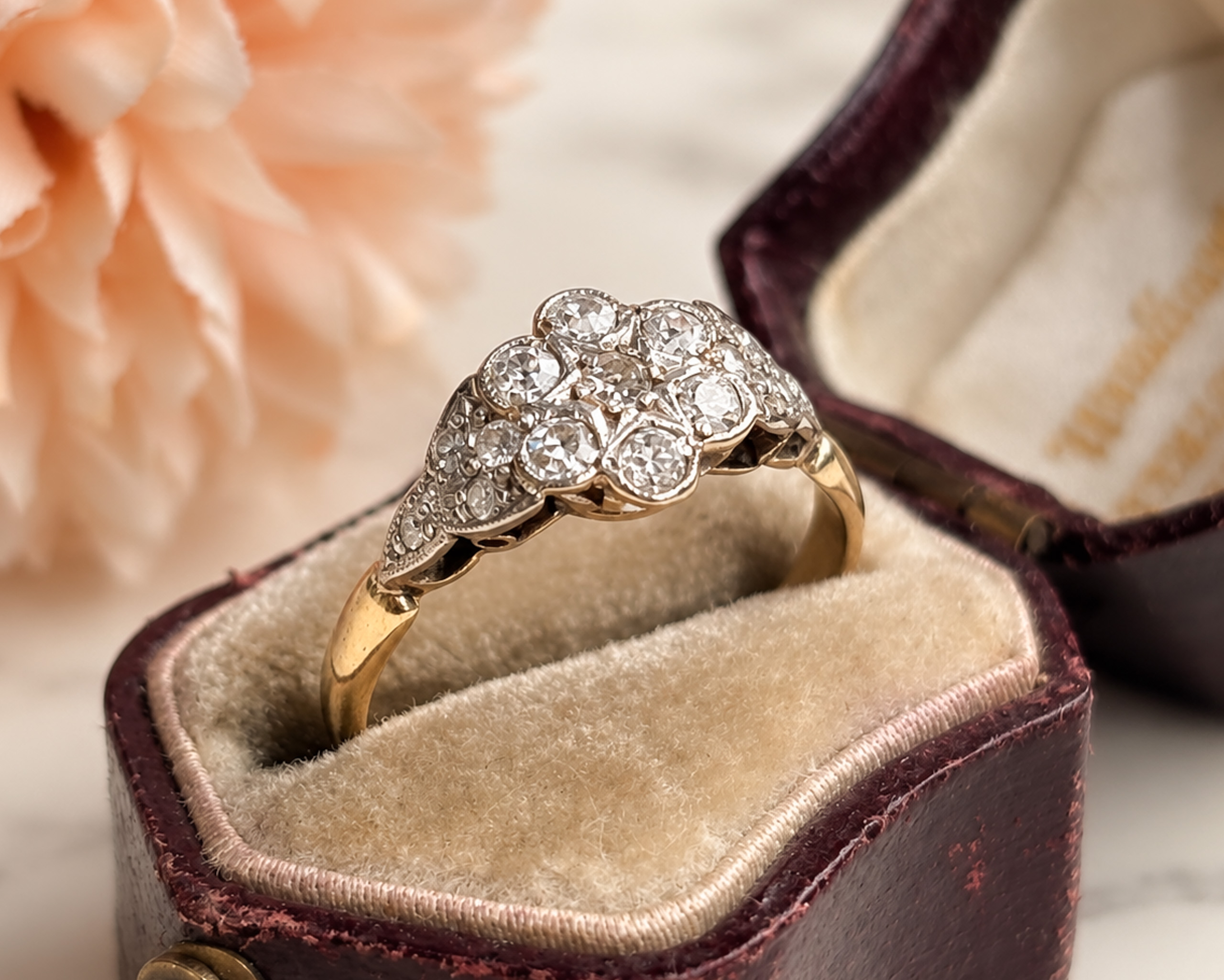 old cut diamond cluster ring in box