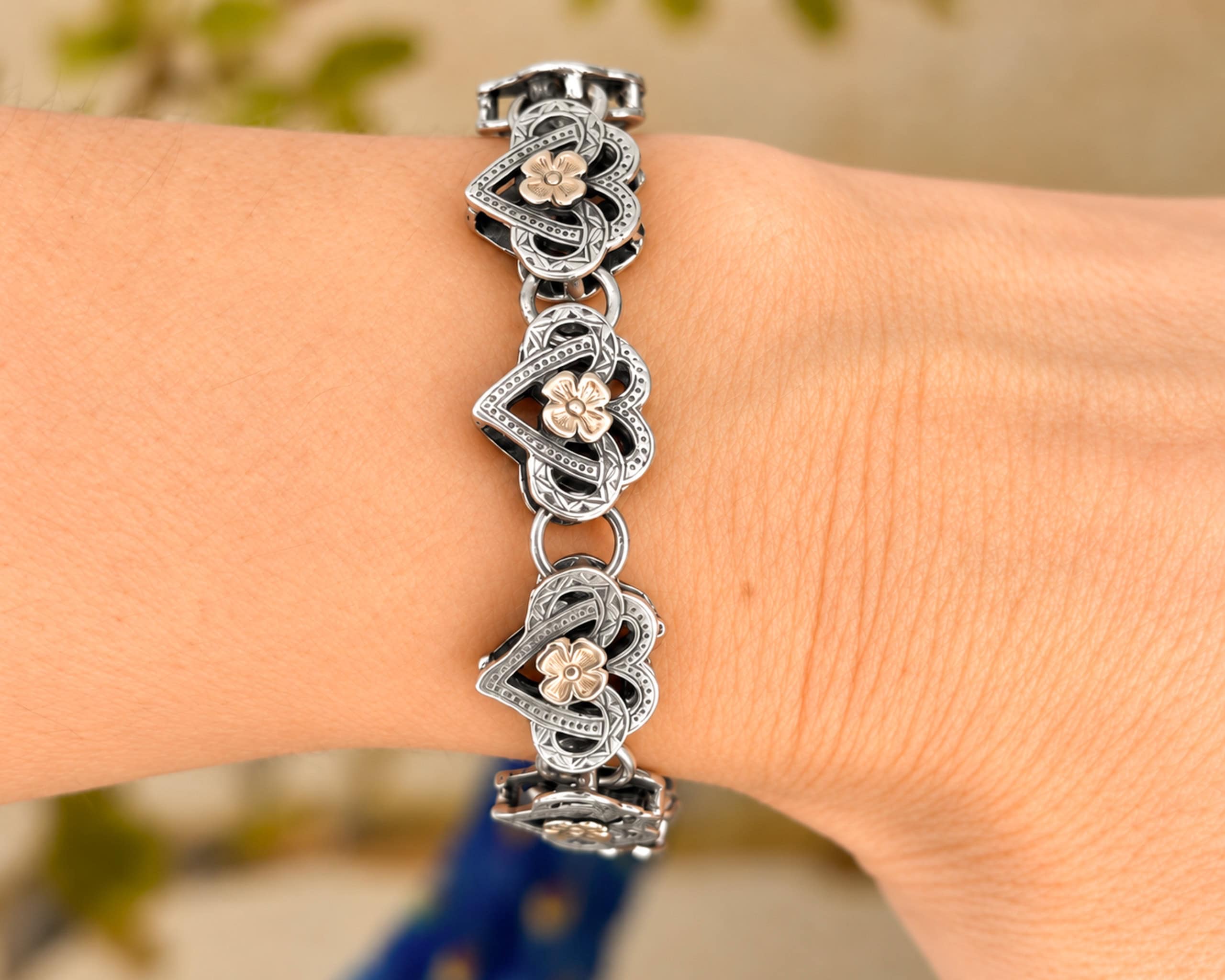 victorian silver and gold bracelet on hand