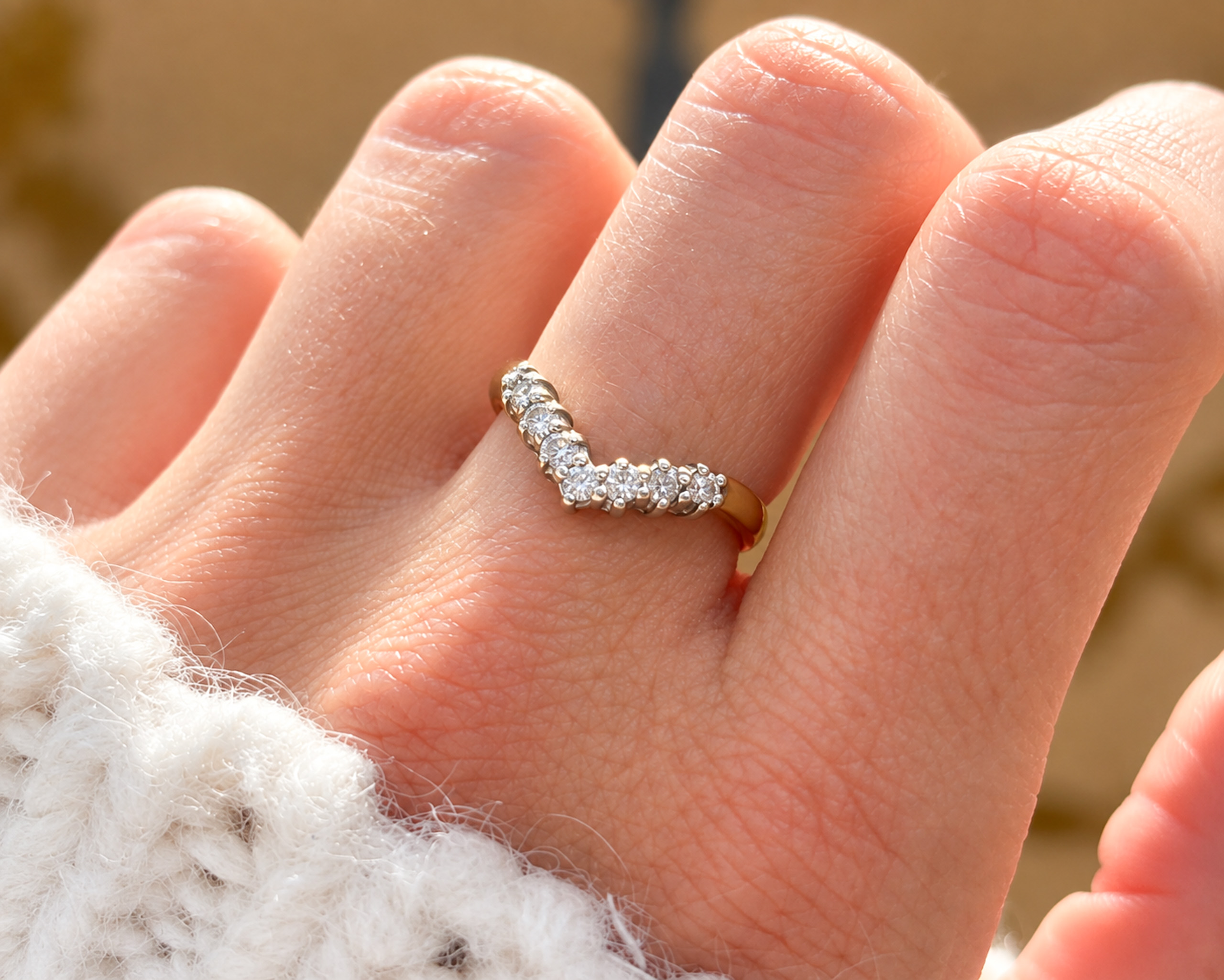 vintage diamond wishbone ring on hand