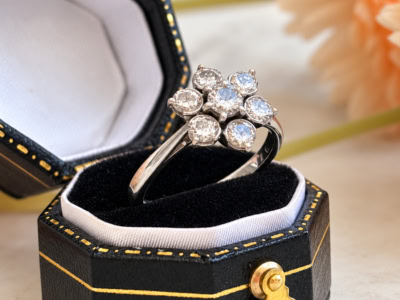 vintage diamond flower ring in 18ct white gold and platinum for sale in Leeds