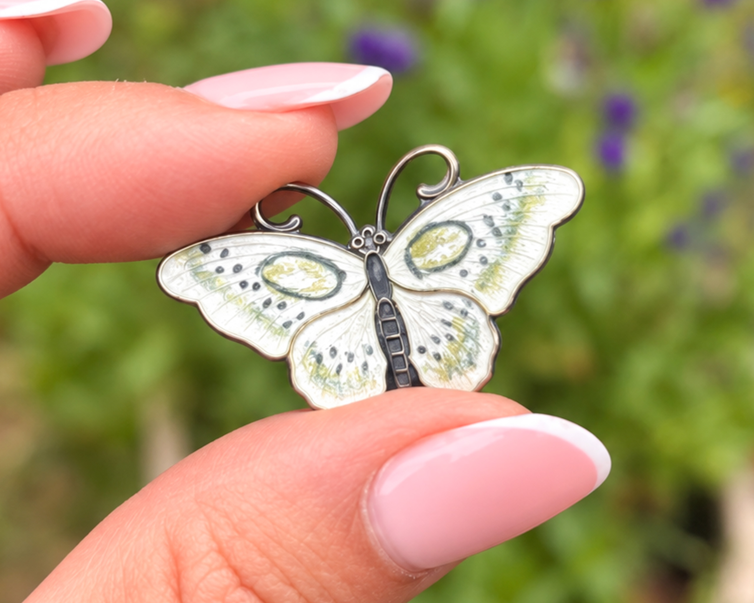 white butterfly brooch