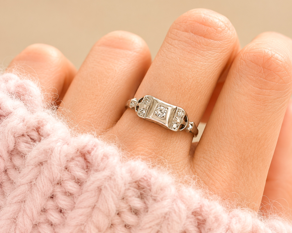 art deco diamond plaque ring in 18ct white gold for sale in Leeds shown on a model's hand