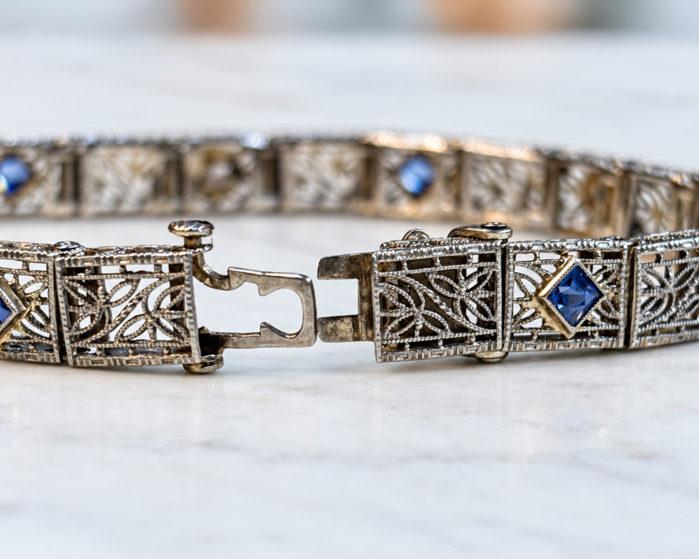 antique 1920s sapphire and diamond filigree bracelet with the clasp open