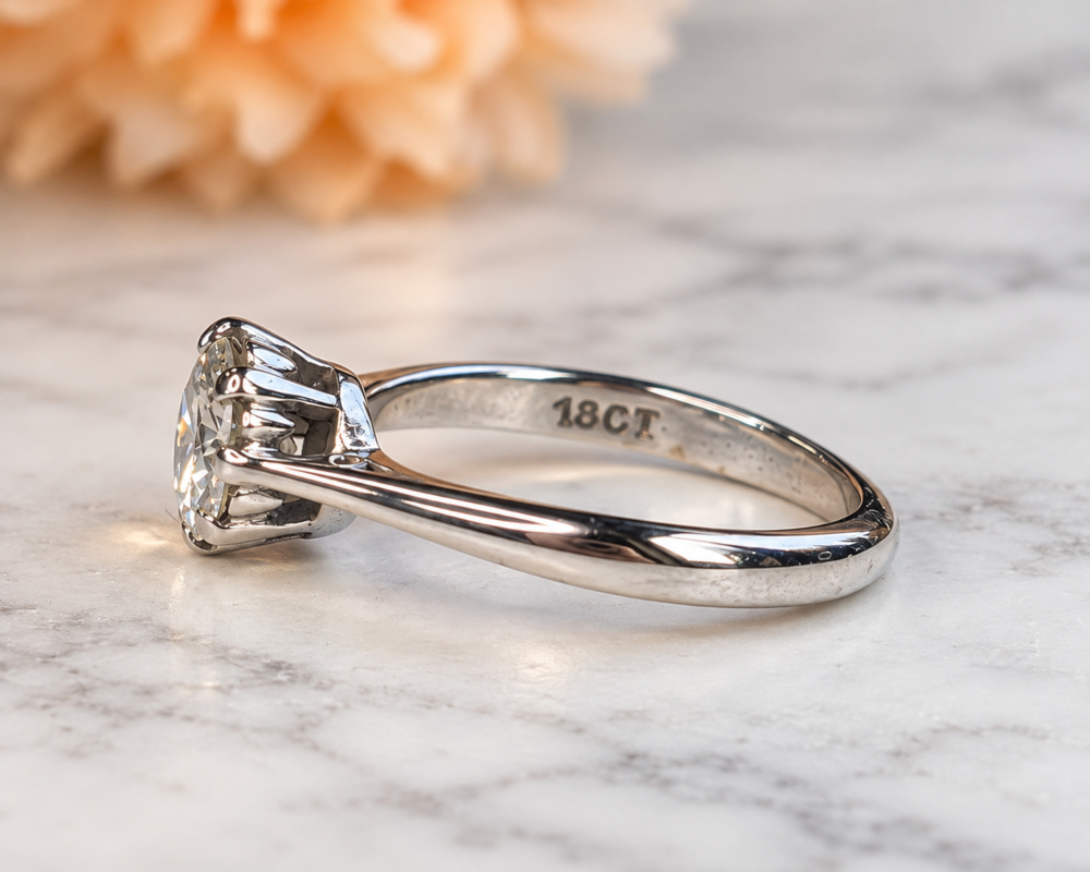 antique 1930s 1ct diamond solitaire ring in 18ct white gold for sale in Leeds, showing side of the ring