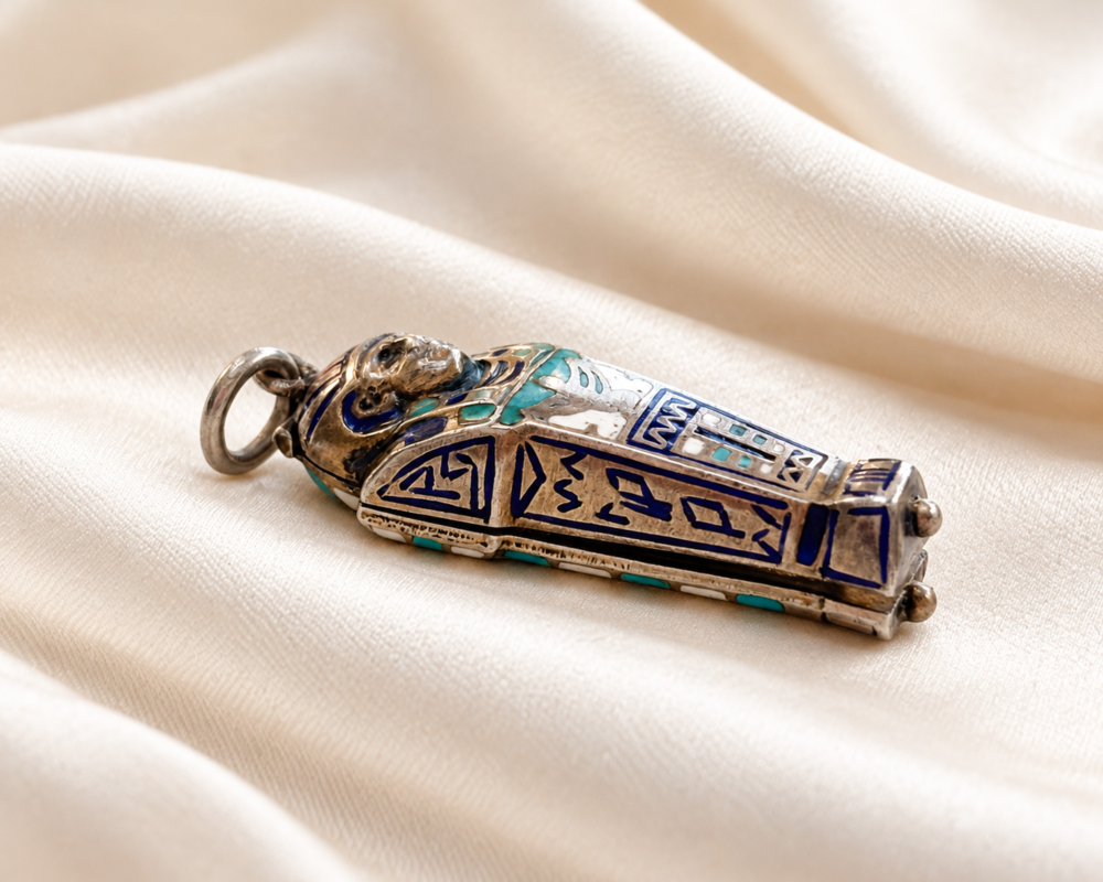 antique Egyptian Revival silver sarcophagus charm for sale in Leeds, showing the side of the charm