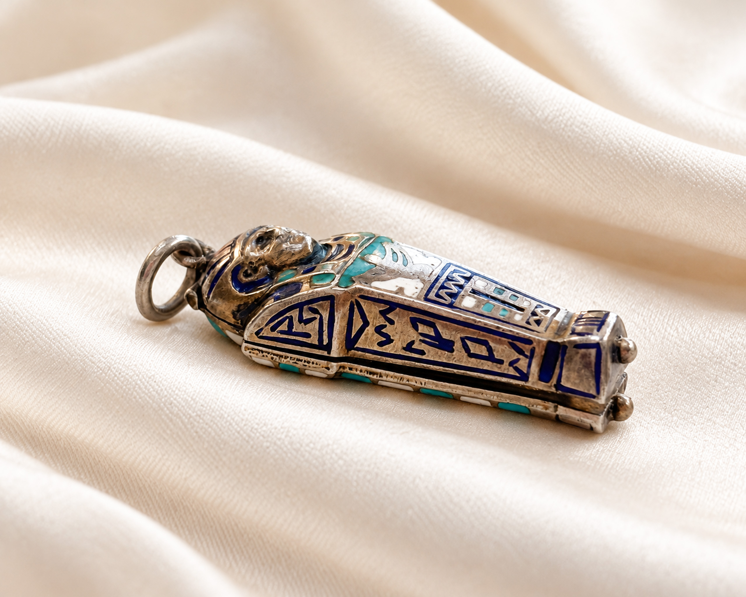 Antique Egyptian Amulet on Champagne Silk