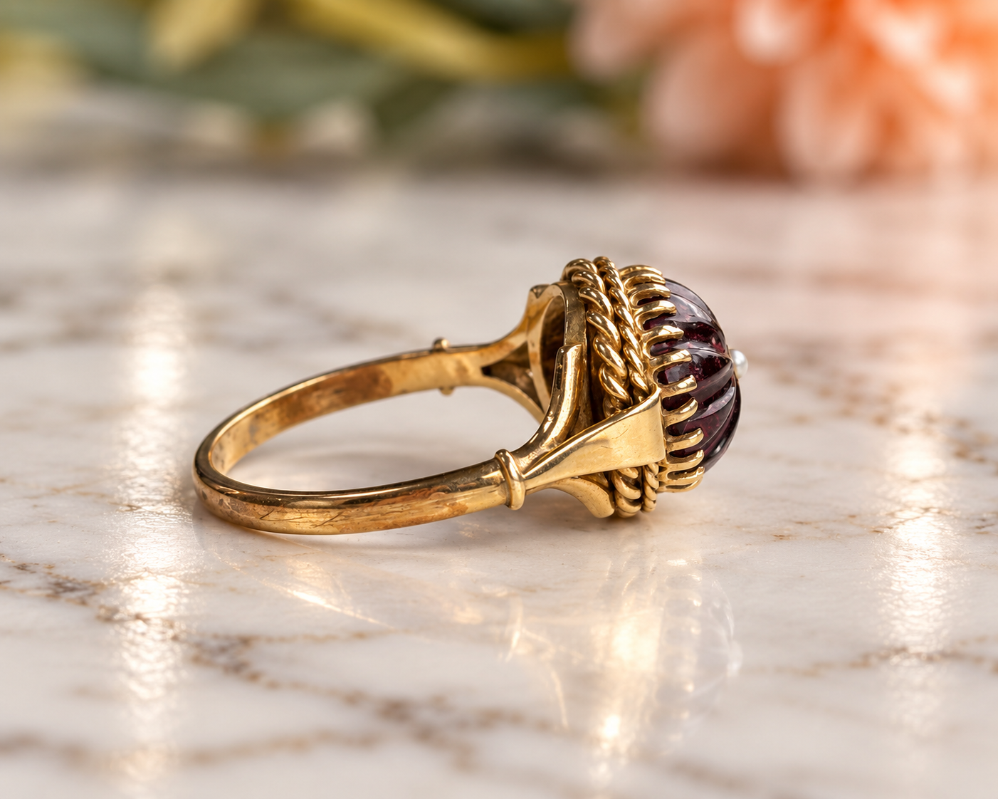 Antique Garnet Ring on Marble