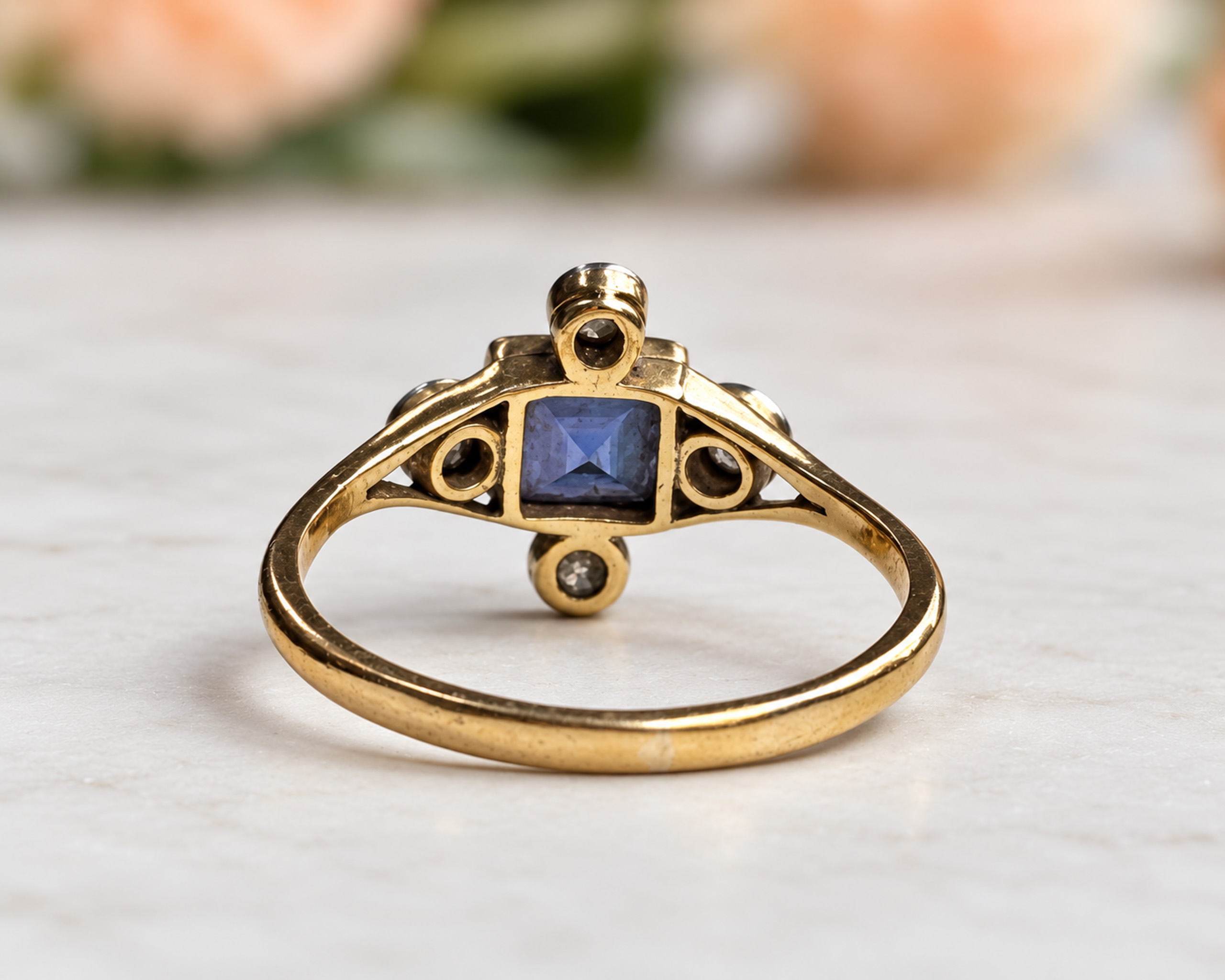Antique Gold Sapphire Ring on Marble