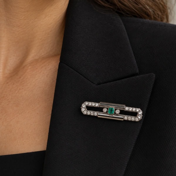 art deco emerald and diamond bar brooch for sale in Leeds, shown on a blazer lapel