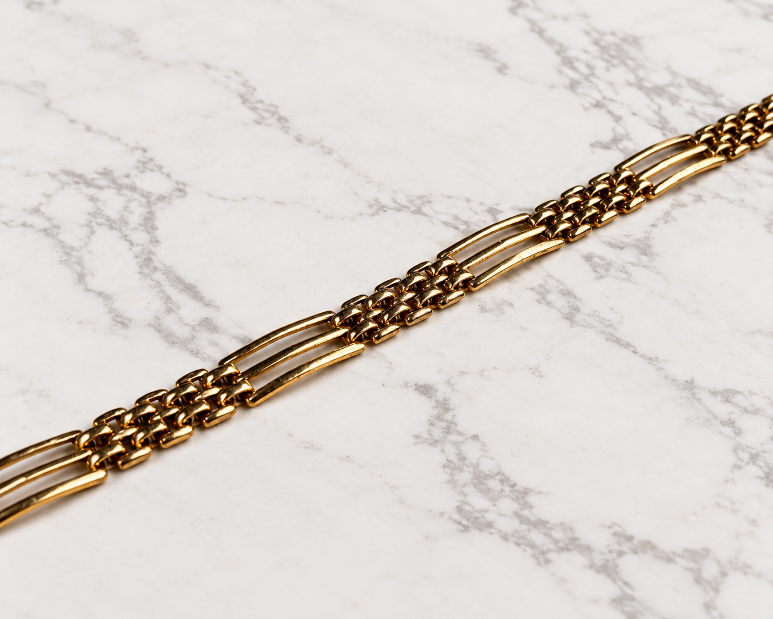 Edwardian gold gate bracelet flatlay